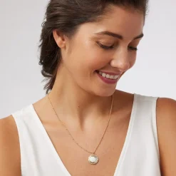 The Met Store Celestial Symbols Carved Mother-of-Pearl Pendant Necklace
